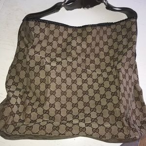 Very used Gucci Design bag.